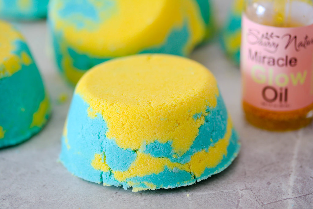 Lemon-Lime Bath Bombs are an invigorating blend of lime and lemon essential oil to make an all-natural refreshing bath bomb.