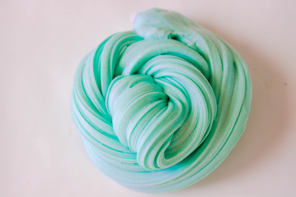 Easy four ingredient tide slime that requires no glue. This Simple recipe can be made by anyone and is the perfect #summer kids craft